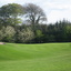 Seventh Loch Par 4 - Ein Blick auf die Grüne durch die Hügel am Ansatz versteckter