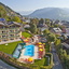 Hotel Berner with terrace and pool, Zell am See in the bakcground Hotel Berner with terrace and pool, Zell am See in the bakcground
