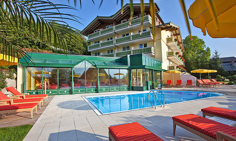Sun terrace with pool and the Hotel Berner Zell am See. Hotel Berner Zell am See