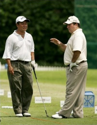 Kyi Hla Han of Myanmar (L) and Australian golfer Craig Parry Asian Tour 50-50 on mega OneAsia Tour