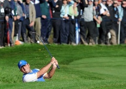 Europe's Francesco Molinari plays out of a bunker Europe start strongly in Ryder Cup climax