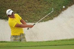 Panuphol Pittayarat Flu-hit Thai teen takes golf lead in Malaysia