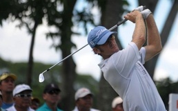 Henson posted a one-under-par 71 in tough scoring conditions Golfer Henson leads by two at the Philippine Open