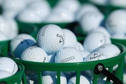 Baskets of golf balls sit on the green New Caledonia joins Australasian PGA tour