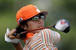 Ryo Ishikawa of Japan watches a tee shot during a practice round prior to the start of the US Open in Bethesda No Japan PGA action over Ishikawa driving row
