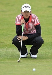 Yani Tseng of Taiwan lines up her putt on the second green Tseng on song at British Open
