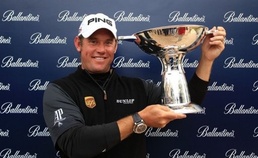 Lee Westwood of England poses with the winner's trophy after the final round of the Ballantine's Championship in Incheon Wonderful Westwood wins Ballantine's