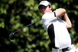 Woods shows long-absent form, chases McIlroy at Masters