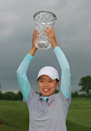 Sun Young Yoo of South Korea holds the championship trophy Yoo wins LPGA Sybase Match Play crown