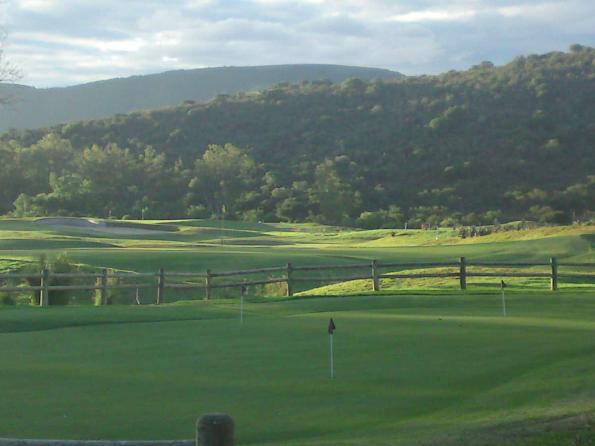 Looking out you can see the putting green the 18'th hole and hole number 1 just on top of the big bunker.