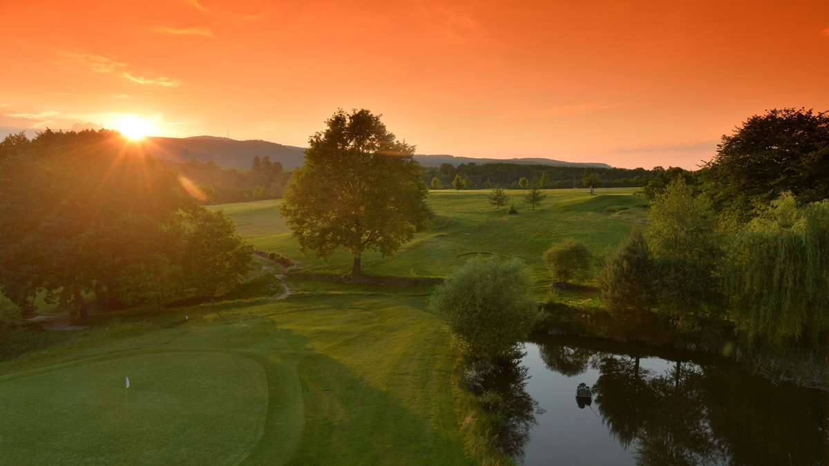 View from terace to Hole 2 and sunset